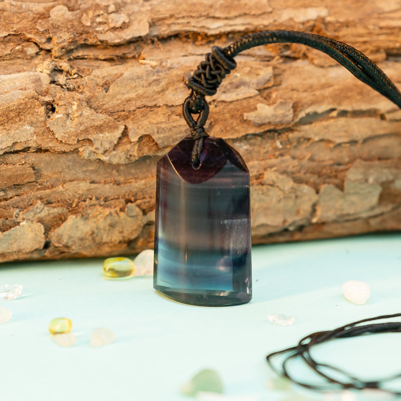 "Radiant Vitality: The Rainbow Fluorite Pendant"