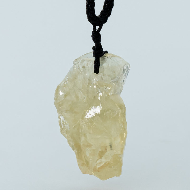 "Radiant Sunlight: Natural Yellow Crystal Pendant"