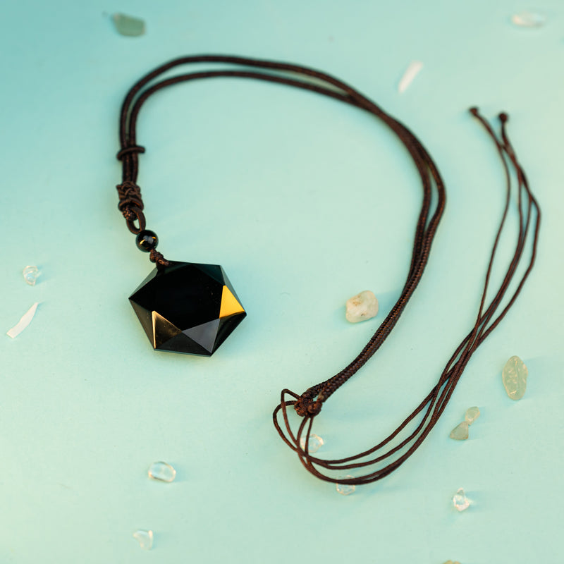 "Obsidian Six-Pointed Star Pendant: Strength, Protection, and Balance"