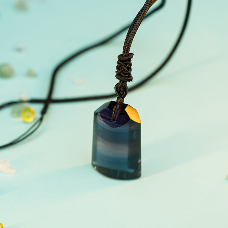 "Radiant Vitality: The Rainbow Fluorite Pendant"