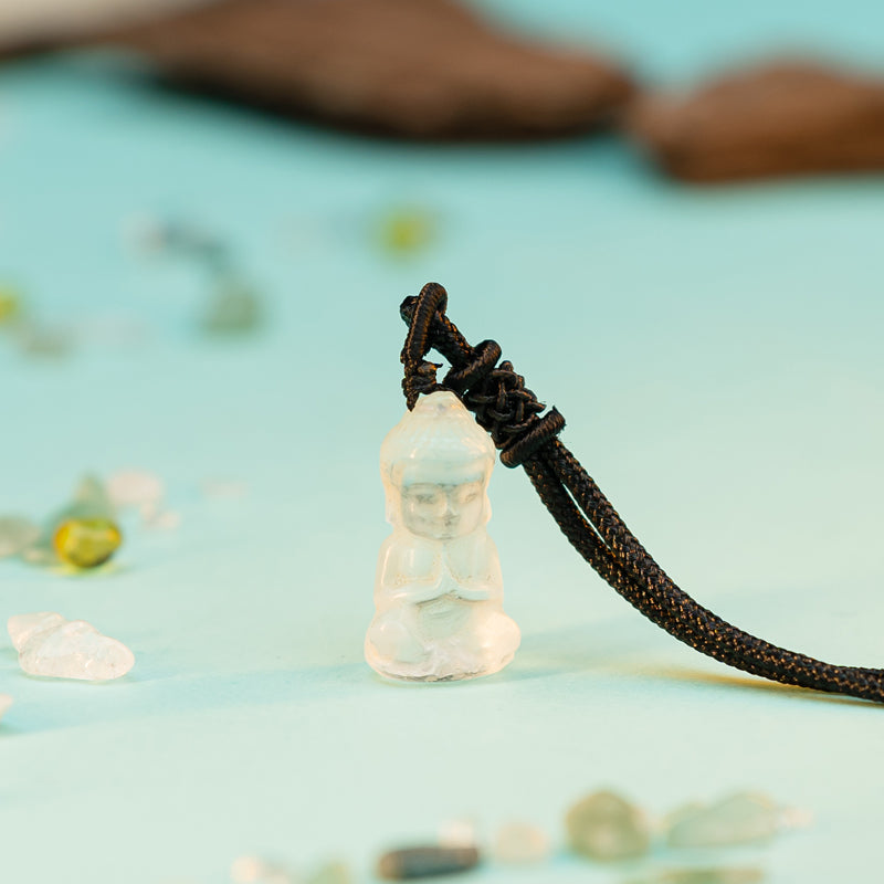 "Embracing Wisdom and Tranquility: The White Crystal Buddha Pendant"