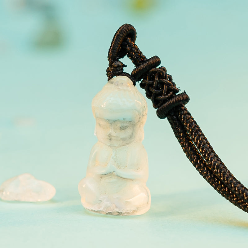 "Embracing Wisdom and Tranquility: The White Crystal Buddha Pendant"