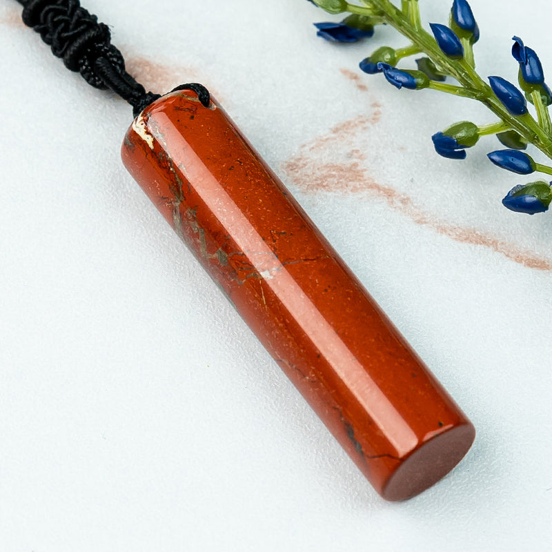 "Embracing Passion and Vitality: The Red Jade Pendant"