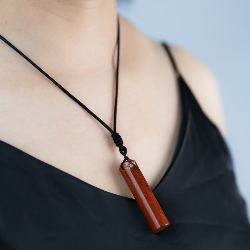 "Embracing Passion and Vitality: The Red Jade Pendant"