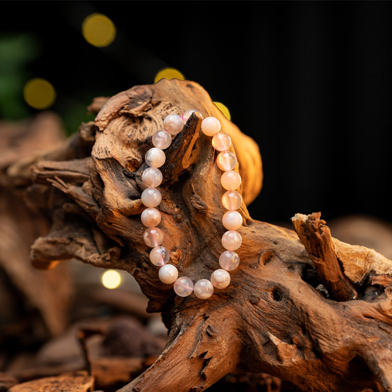 "Whispers of Spring: The Delicate Blossom of a Cherry Quartz Bracelet"