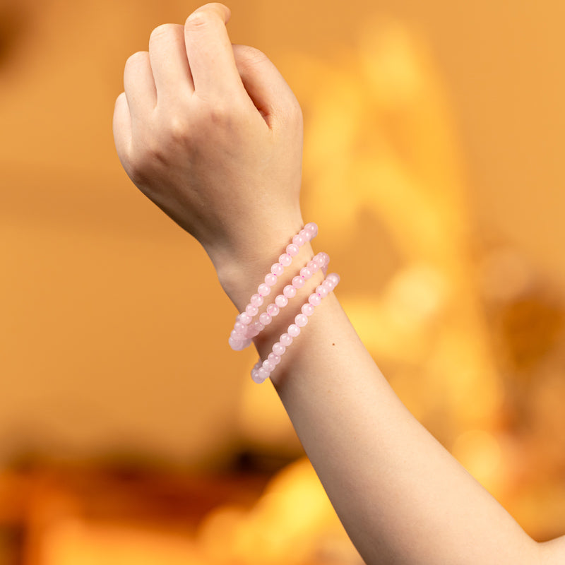 Tripled Radiance: Triple Wrap Rose Quartz Bracelet