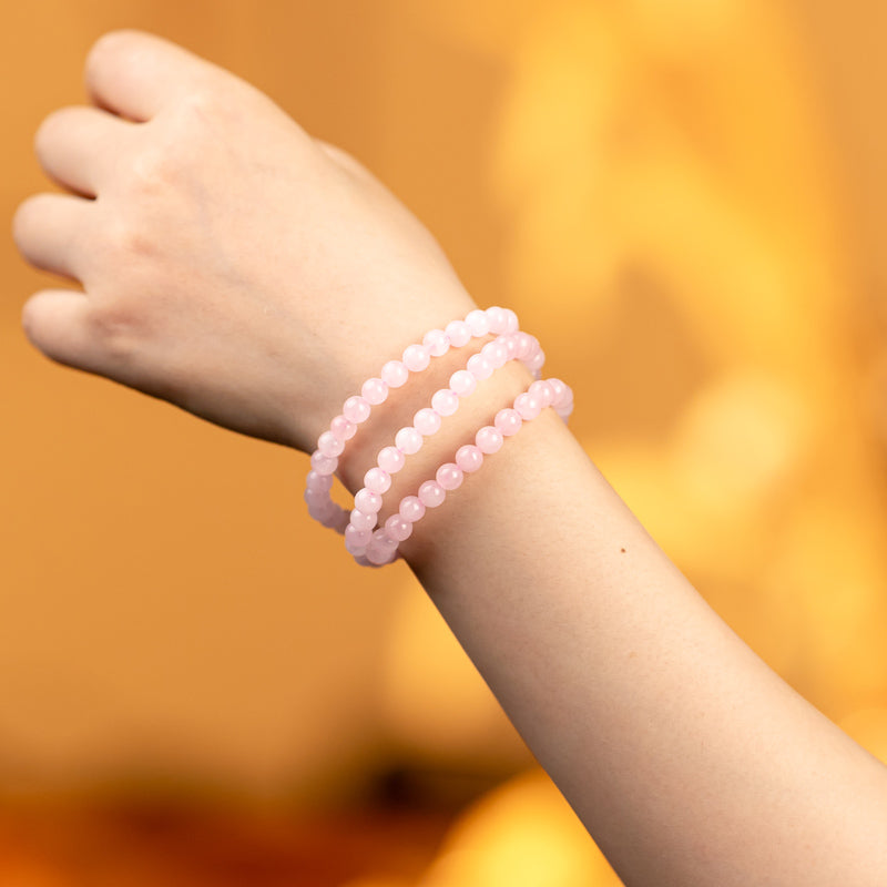 Tripled Radiance: Triple Wrap Rose Quartz Bracelet