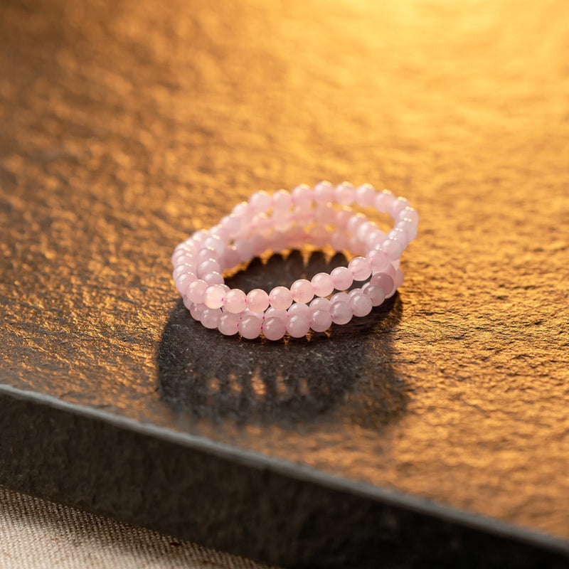 Tripled Radiance: Triple Wrap Rose Quartz Bracelet