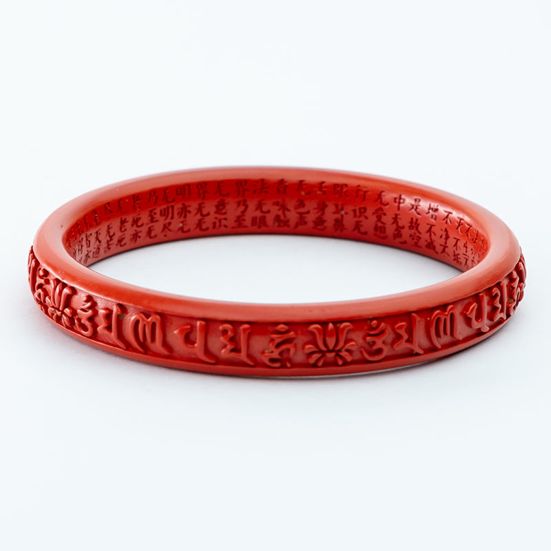 "The cinnabar bracelet: The mysterious allure of red gemstones"