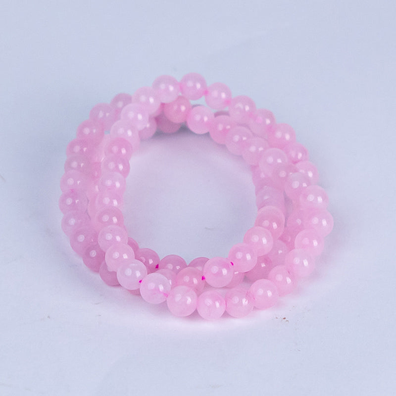 Tripled Radiance: Triple Wrap Rose Quartz Bracelet