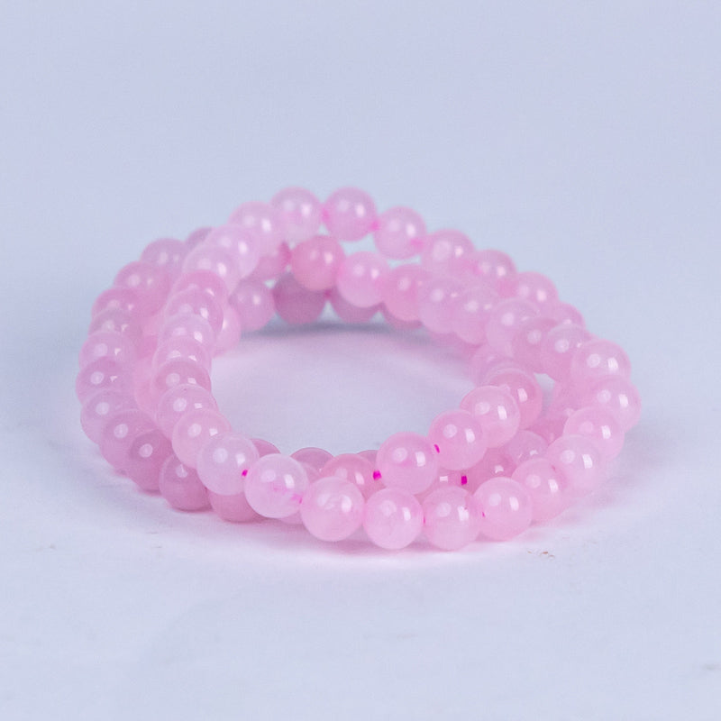 Tripled Radiance: Triple Wrap Rose Quartz Bracelet