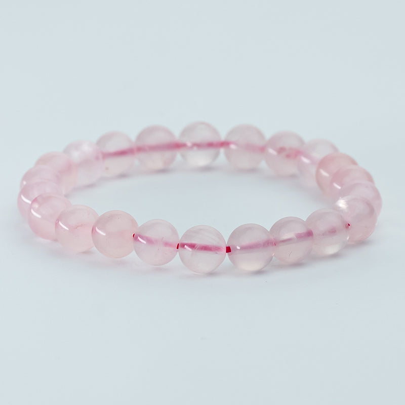 "Embrace of Love: The Tender Charm of a Rose Quartz Bracelet"