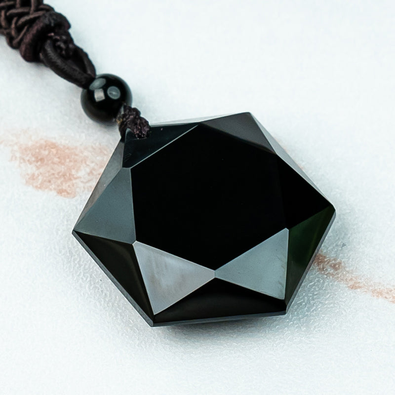 "Obsidian Six-Pointed Star Pendant: Strength, Protection, and Balance"