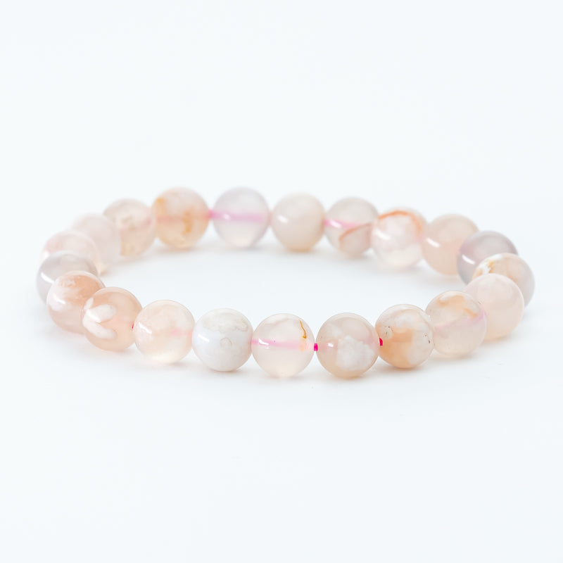 "Whispers of Spring: The Delicate Blossom of a Cherry Quartz Bracelet"