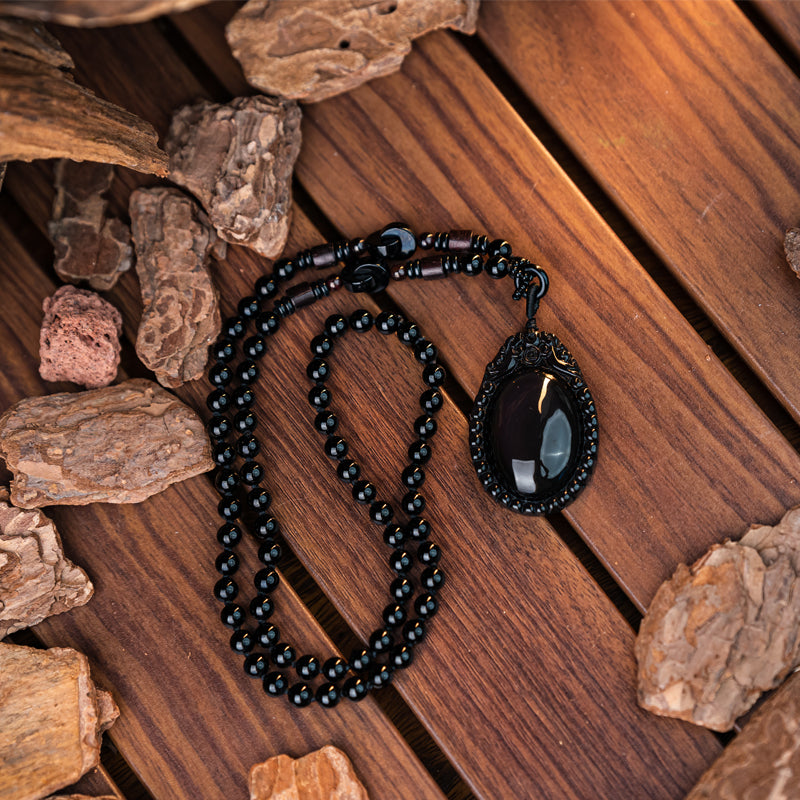 "The Symbolism of Wearing a Black Obsidian Necklace: Suitable Individuals and Zodiac Signs"