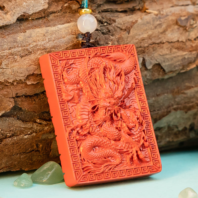 "Artisan's Legacy: The Hand-Carved Cinnabar Dragon Amulet Pendant"