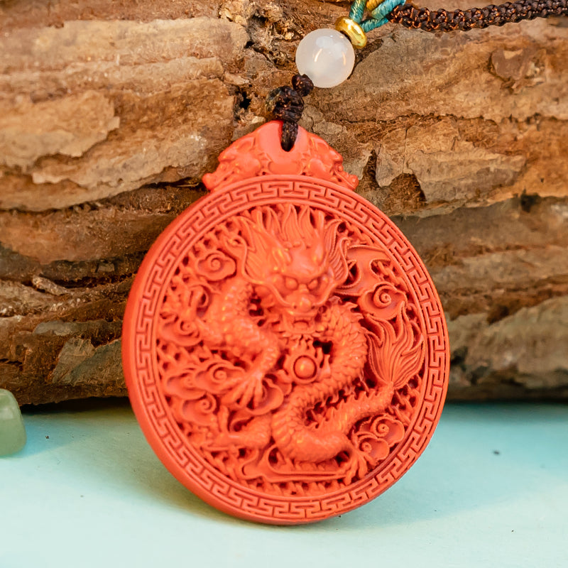 "Dragon's Embrace: Hand-Carved Cinnabar Dragon Medallion Necklace"