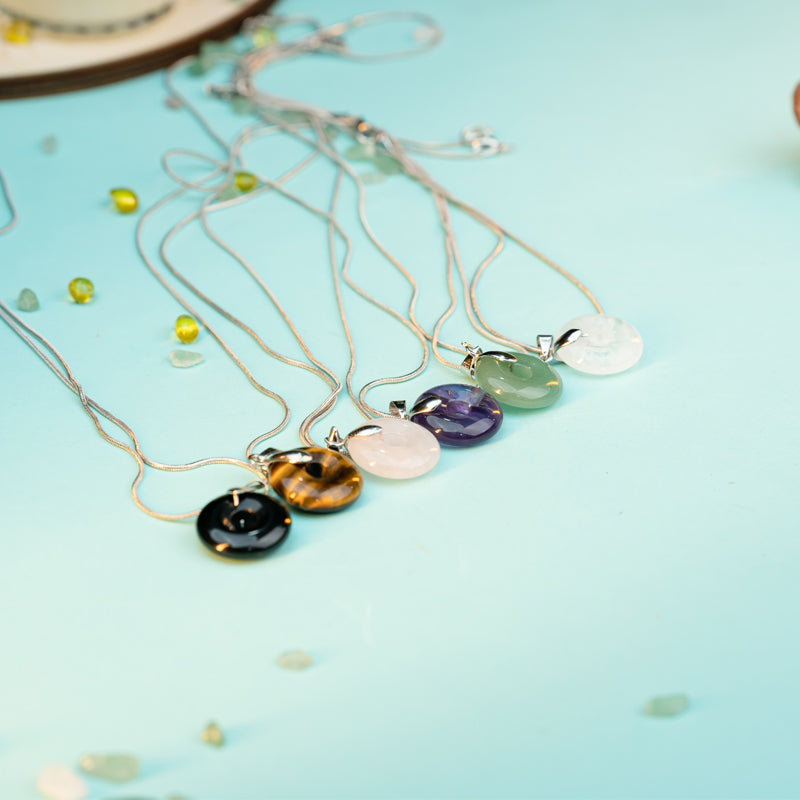 "Crystals of Affinity: Gemstone Necklaces for Personal Growth and Zodiac Harmony"