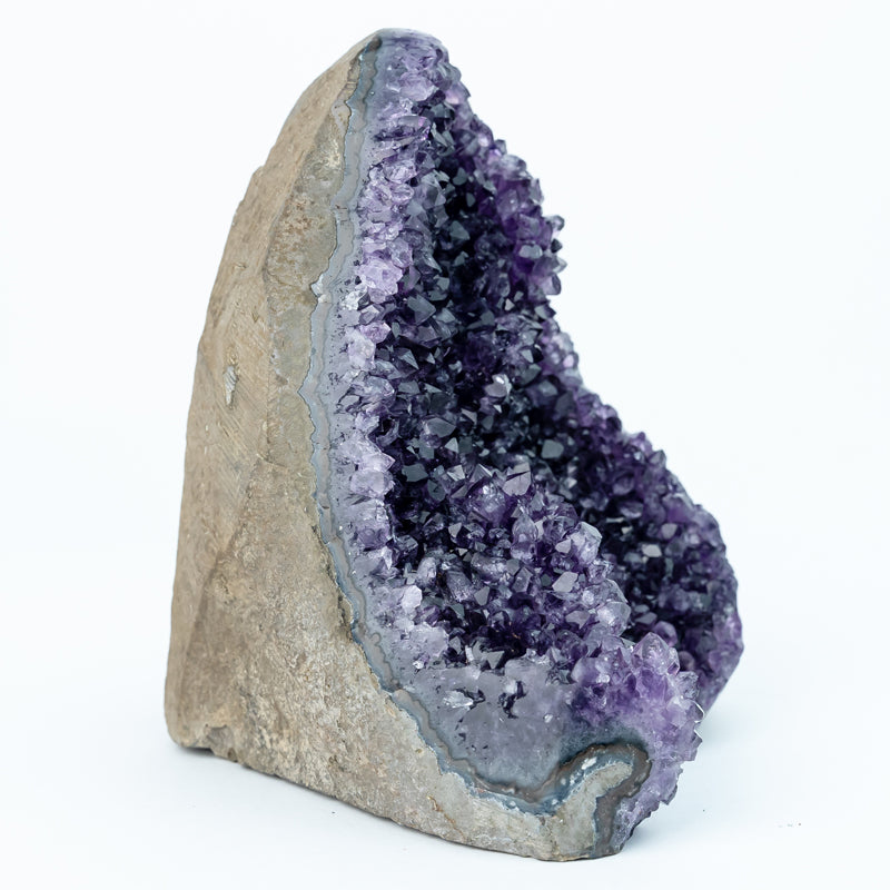 "Mystic Radiance: The Enchanting Allure of an Amethyst Raw Stone Decor Piece"