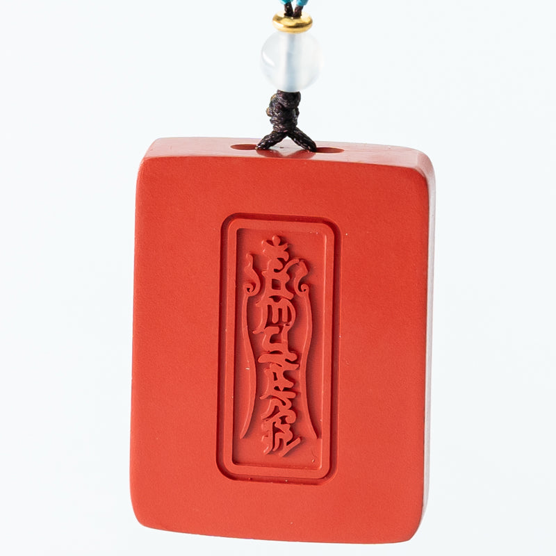 "Red Mystery: Exquisite Handmade Cinnabar Pendant"