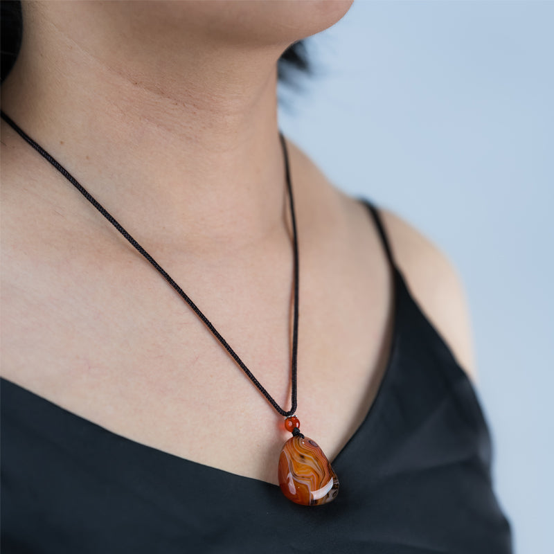 "Tranquil Strength: The Chalcedony Pendant"