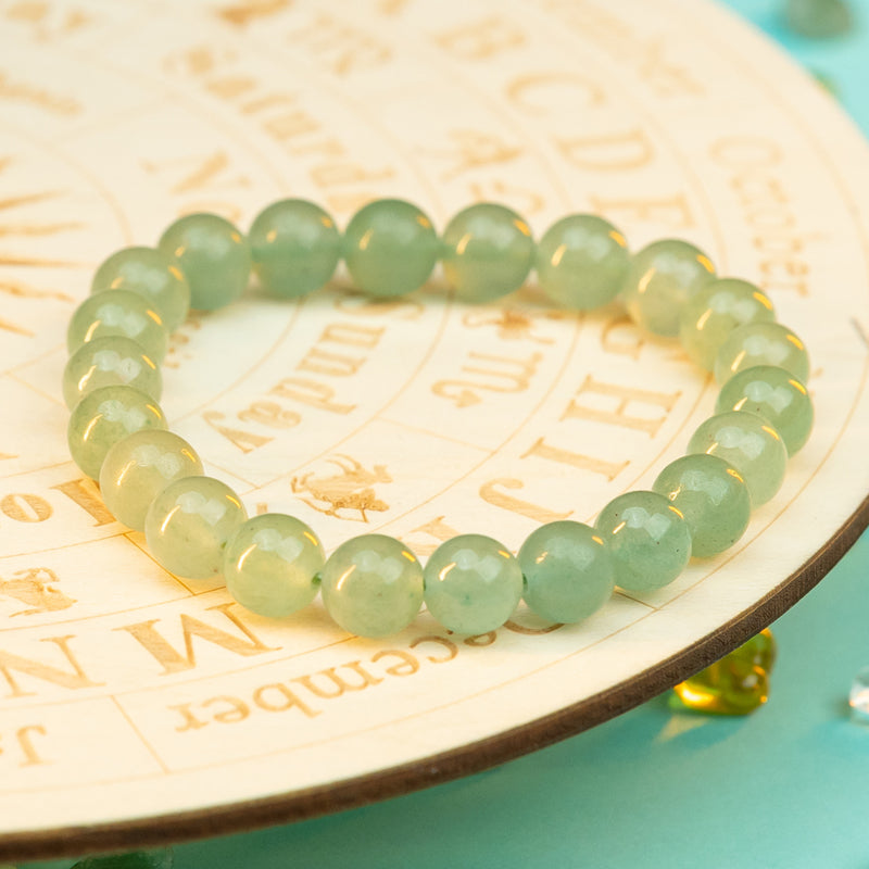 "Whispers of Serenity: Embracing the Healing Glow of a Prehnite Bracelet"