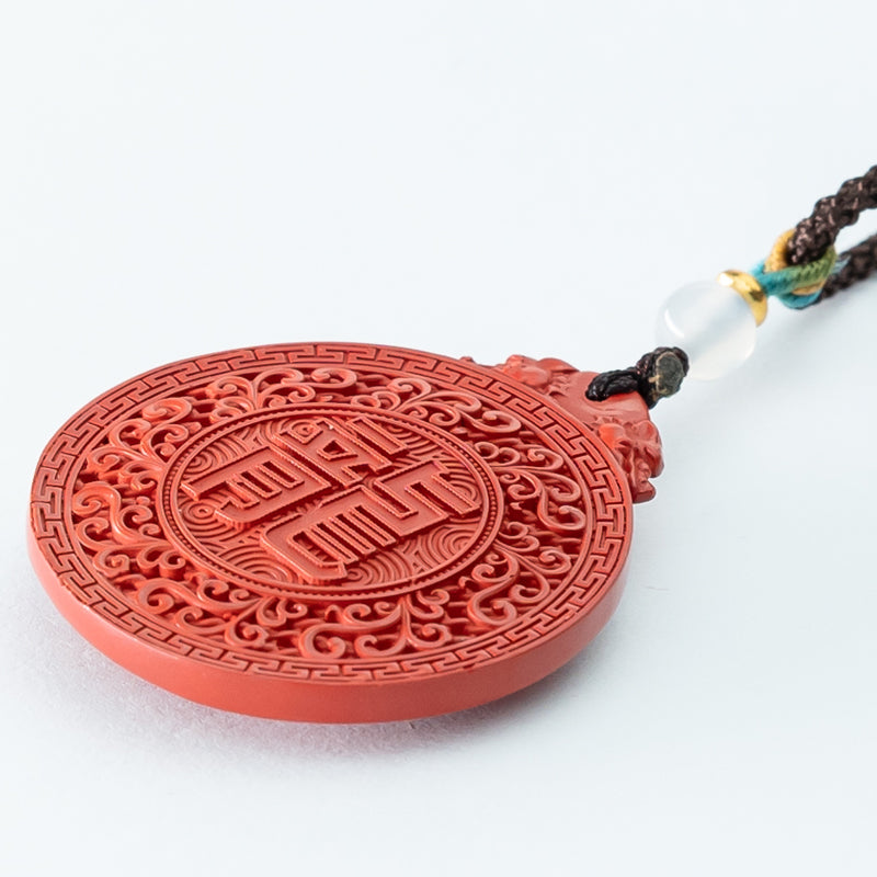 "Dragon's Embrace: Hand-Carved Cinnabar Dragon Medallion Necklace"