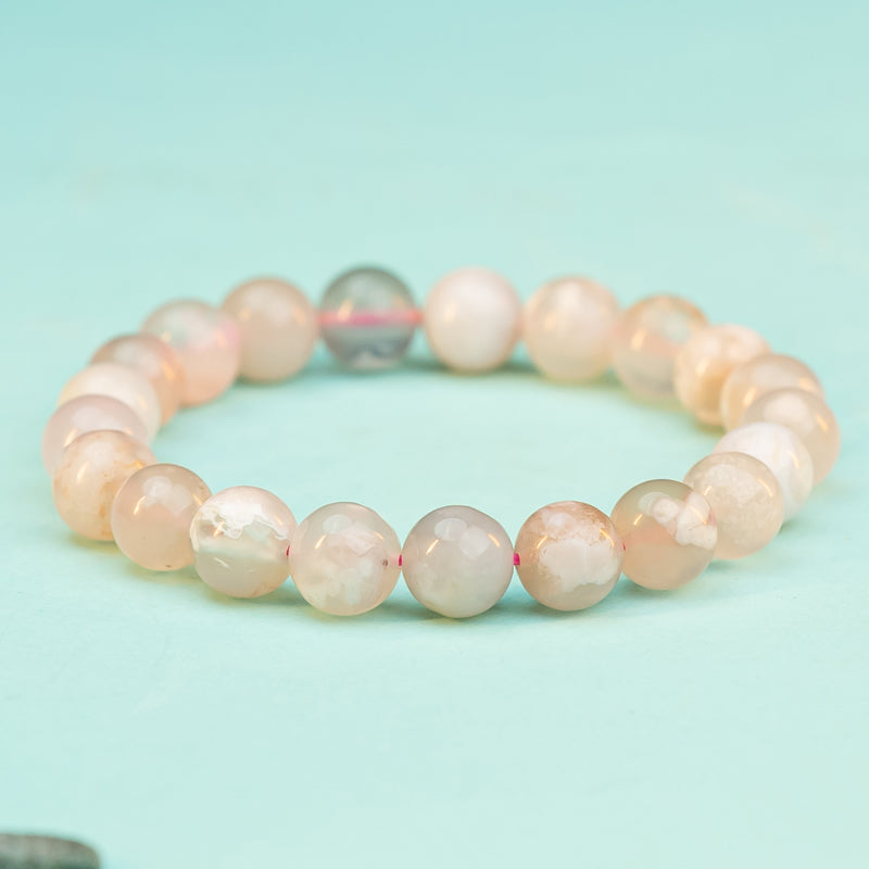 "Whispers of Spring: The Delicate Blossom of a Cherry Quartz Bracelet"