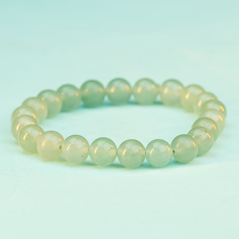 "Whispers of Serenity: Embracing the Healing Glow of a Prehnite Bracelet"