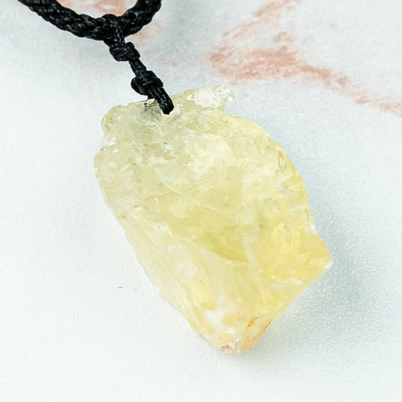 "Radiant Sunlight: Natural Yellow Crystal Pendant"