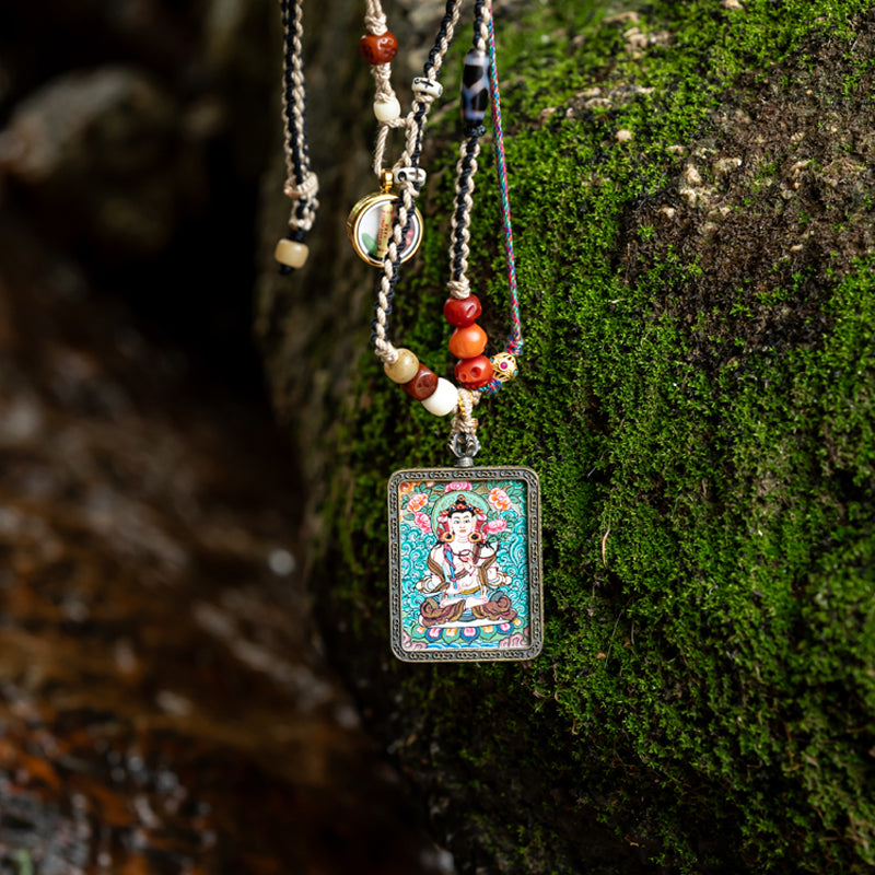 "Divine Tapestry: The Exquisite Thangka Amulet Pendant"