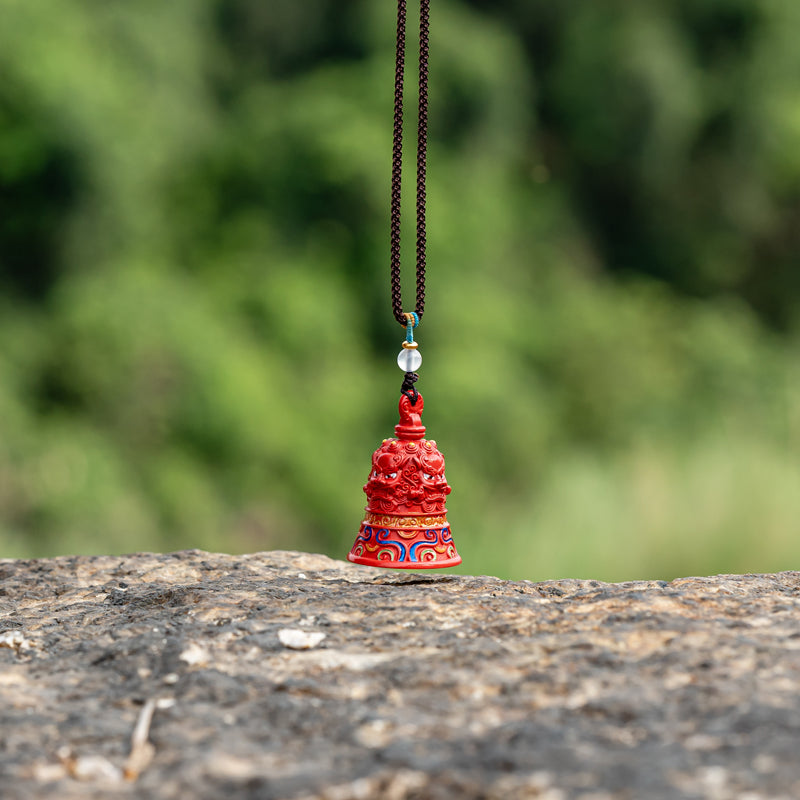 "Divine Echoes: The Cinnabar Bell Pendant for Rituals and Divination"